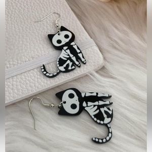 NIP ACRYLIC SKELETON CAT EARRINGS